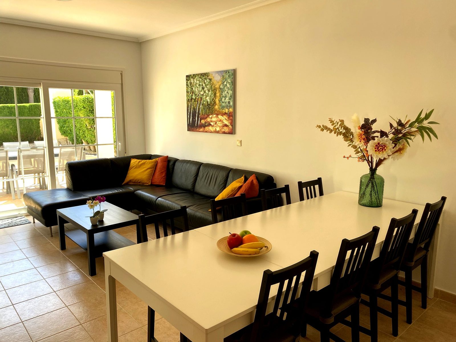 Woonkamer met eethoek in Villa Excelente